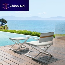 Contemporary armchair RIVIERAfabricaluminumwith footrest