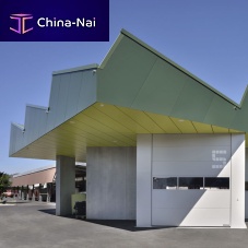 Ventilated facade cladding CELLON - TRAINING CENTER ANDELFINGENpanelin wood fiberHPL