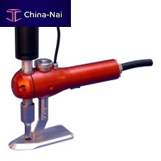 Hand-held fabric cutter