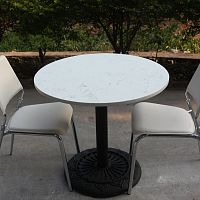 Contemporary table T037cast ironquartzround