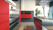 Contemporary kitchen vstainless steellaminateisland