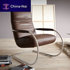 Contemporary armchair JACYleathermetalwith footrest