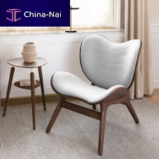 Contemporary lounge chair A CONVERSATION PIECEleatheroakupholstered