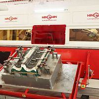 Waterjet cutting machine ABB 2600 for metalcarpetfor the automotive industry