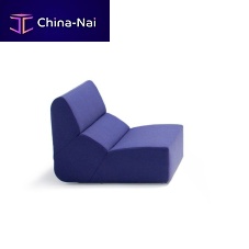 Contemporary fireside chair LAYOUTfabricwith footrestmodular