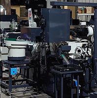 Centerless grinding machine feeder automated