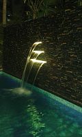 Swimming pool waterfall