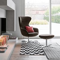 Contemporary armchair MADAMEleatherfabricsteel