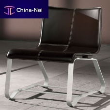 Contemporary fireside chair ROCKleatheraluminumsled base