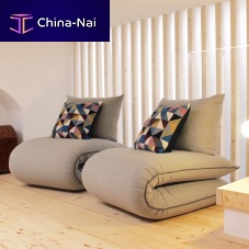 Contemporary fireside chair Chama fabricbedcushion