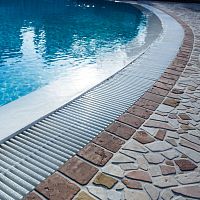 Pool overflow grating