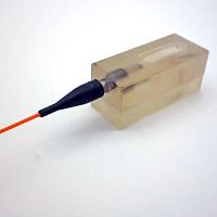Fiber optic vibration sensor gearrugged