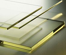 Radiation shielding glass